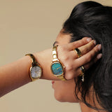 Capri – Goudkleurig met smaragdgroene wijzerplaat